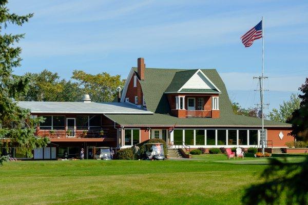 Sunny summer day at the Manistee Golf & Country Club clubhouse