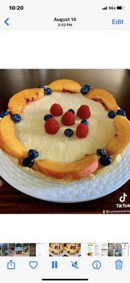 Lemon cheesecake adorned with fruit for summer