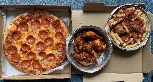 Pepperoni pizza, wings, ziti with meatballs.