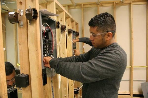 A Commercial Electrical Apprentice in the lab