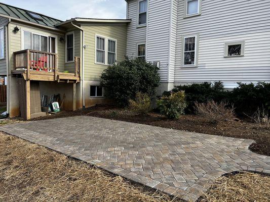 Transplants and stone patio