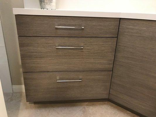 custom powder room vanity in white oak with wire brush finish