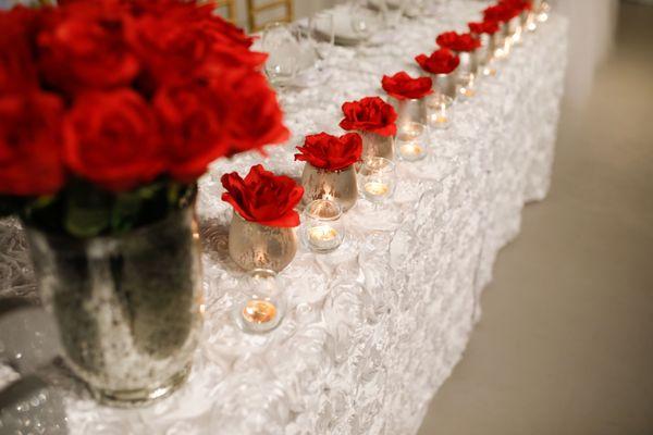 Want a beautiful head table for your wedding? This is one of our many options