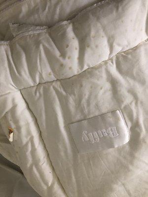 Stained /burned spots on corners of my comforter