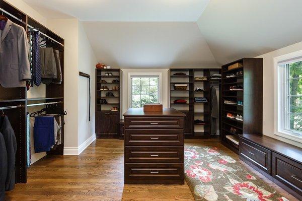 Masculine dark wood tone with raised panel custom doors & drawers.