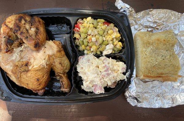 From the deli - fresh barbecued chicken, bacon potato salad, edamame salad, and garlic bread (~$9)