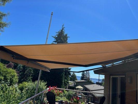 awning opens and closes using a remote from inside the house