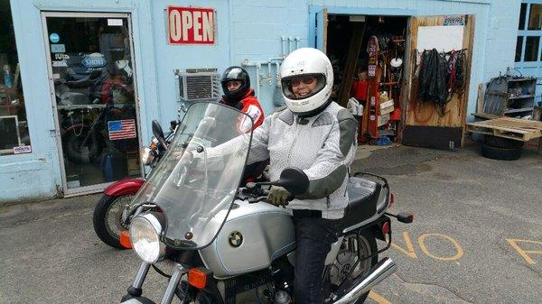 Jini picking her bike up after winter storage.