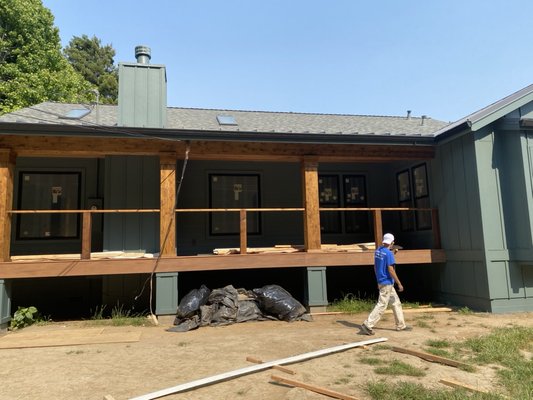 Painted and stained the beams and deck