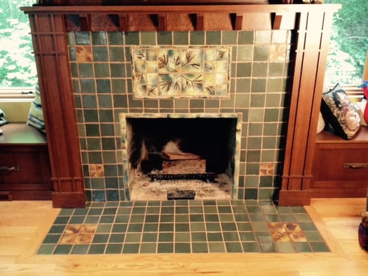 Recent custom fireplace surround. Created and installed by Steve. Stock tile in 2",4" and 6" square...