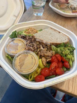 build your own salad bowl with chicken, avocado, romaine, tomato, banana pepper, pickled onion, and hot honey mustard dressing.