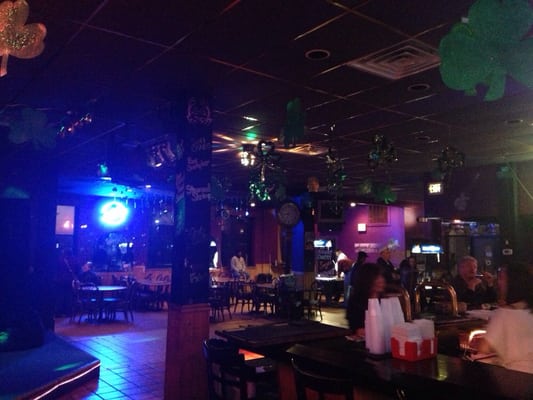 Inside 3 pool tables and a karaoke station to the left(;