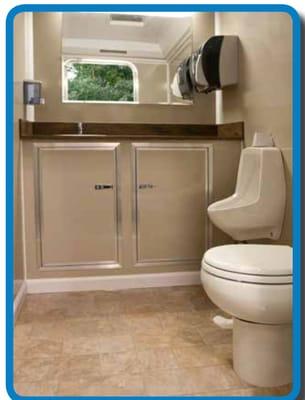 Interior of deluxe portapotty bathroom trailer available for weddings and events.