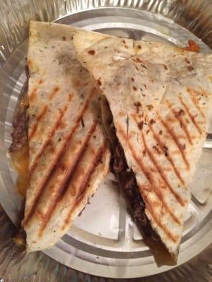 Steak quesadilla - half eaten already (: