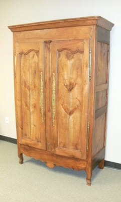 This wild cherry armoire, circa 1860, with all original hardware, is from the city of Vannes, in Bittany, France.