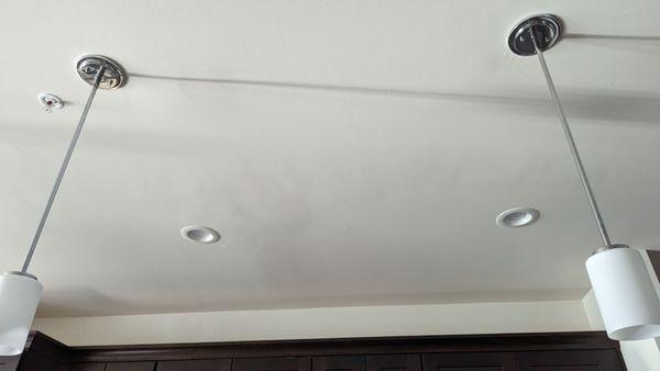 Repaired hole in ceiling. Fresh drywall and paint