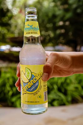 Limoncito is sunshine in a bottle. Made with real lemon, lime, local honey and cane sugar.