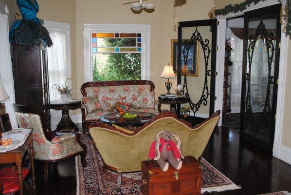 Front parlour of the Swann features tables from Saudi Arabia and Middle Eastern art.