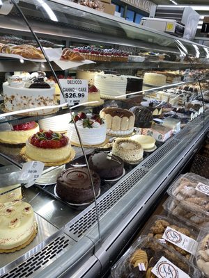 pastry display case  Appears to be immaculately clean, clear clear glass! Yum on everything seen here;)