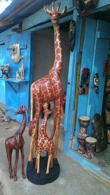 Life like wood carvings of Giraffes