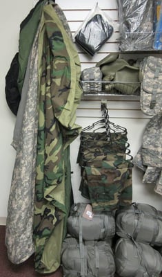 military surplus OGSI camo pants, rain coats, and jackets