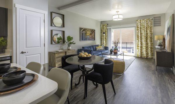 Dining room area with hardwood flooring