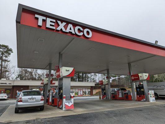 Outside the gas station. This Texaco has 12 pumps. 1.0x zoom.