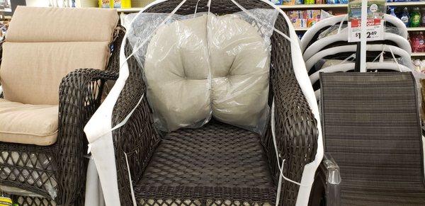 These wicker chairs come with cushions. These chairs were on sale too (slightly under $100 each)