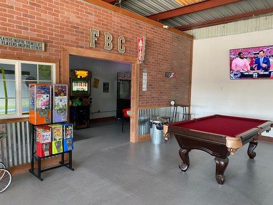 Pool table, sports T.V's and Arcade