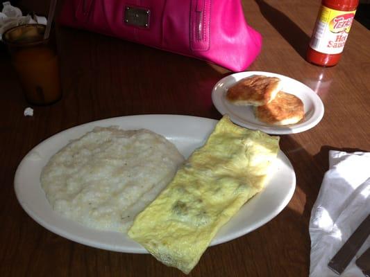 Grits, cheese sausage omelet, and biscuits! Yummy!