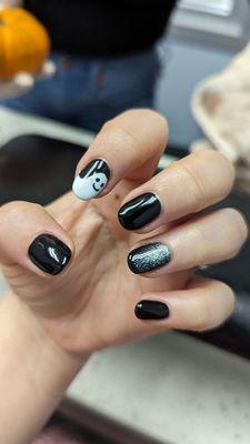 Black nails for Halloween, silver shimmer and cute ghost, gel mani