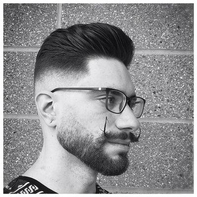 "Modern twist on old school barbering"