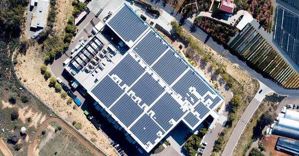 Revel Energy installs 2,900+ commercial solar panels on commercial building.