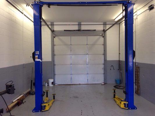 Newly installed 2 post lift for our full service bay including state inspections coming soon.