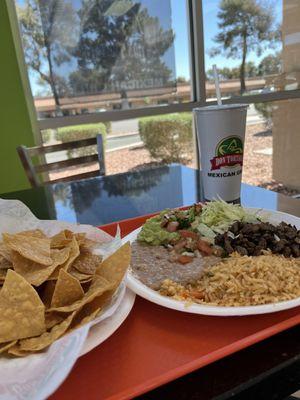 Carne asada meal with chips and a Pepsi Fountain Drink