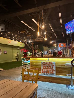 The awesome bar and cornhole field