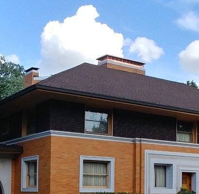 Custom caps for historical homes. One of our many F. Lloyd Wright homes, with a matching cap- designed and installed by A&C!