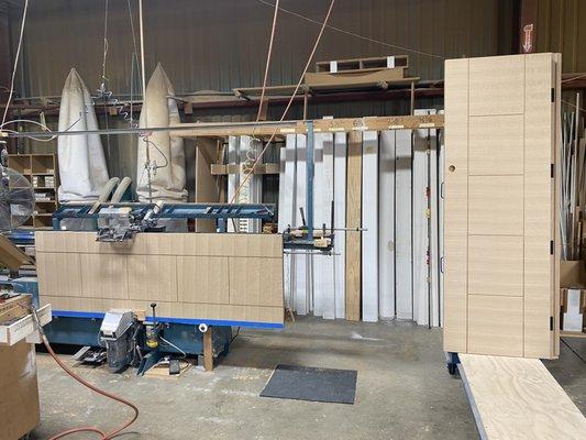 Quarter-sawn white oak flush doors with etched ladder pattern running through the machines. Clean Shop = Clean Product.