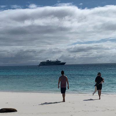 Beach in Galapagos with SilverSea ship in the background