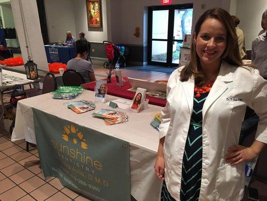 Dr. Avila at the St. Paul Catholic Church Business Fair.