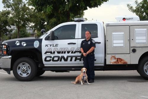 Kyle Animal Control "Officer" Briana Brecher (far right).