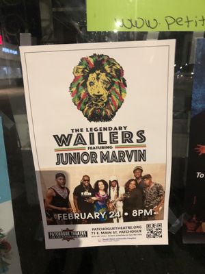 Poster in window of another upcoming show