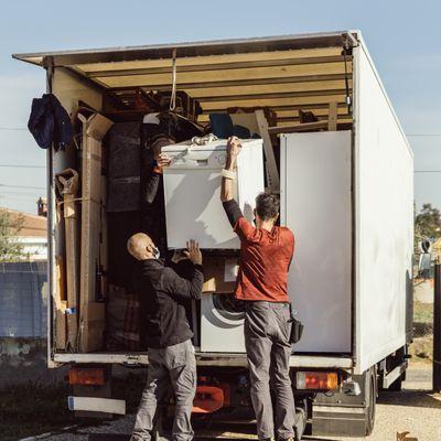 Two man Loading the trucks for ship