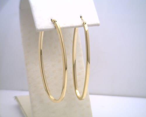 14kt yellow gold oval hoop earrings, also available in rose gold