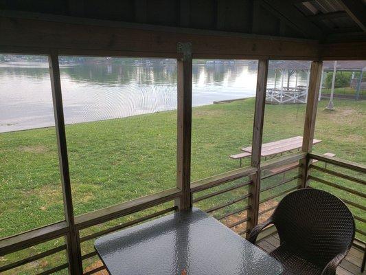 Screened in patio right by the lake.