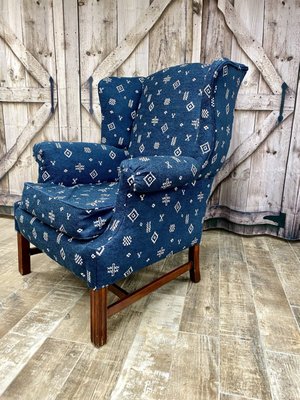 Newly upholstered antique wing chair for a client