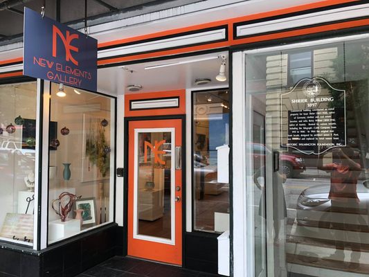 This is our shopfront with art in the window and our new logo!