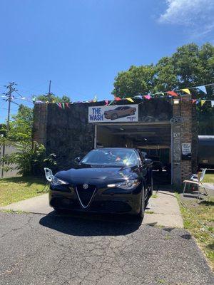 Car wash and freshly washed car