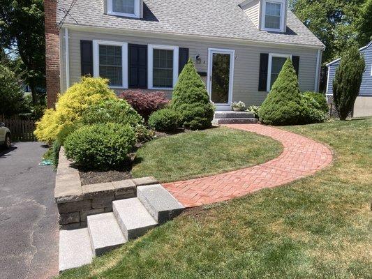 New granite steps and brick walk