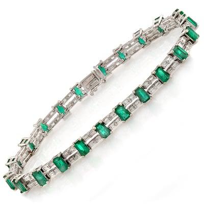 Steal the show with this fantastic Emerald-cut Emerald and Baguette Diamond Bracelet, 18K White gold with Box Clasp Lock.